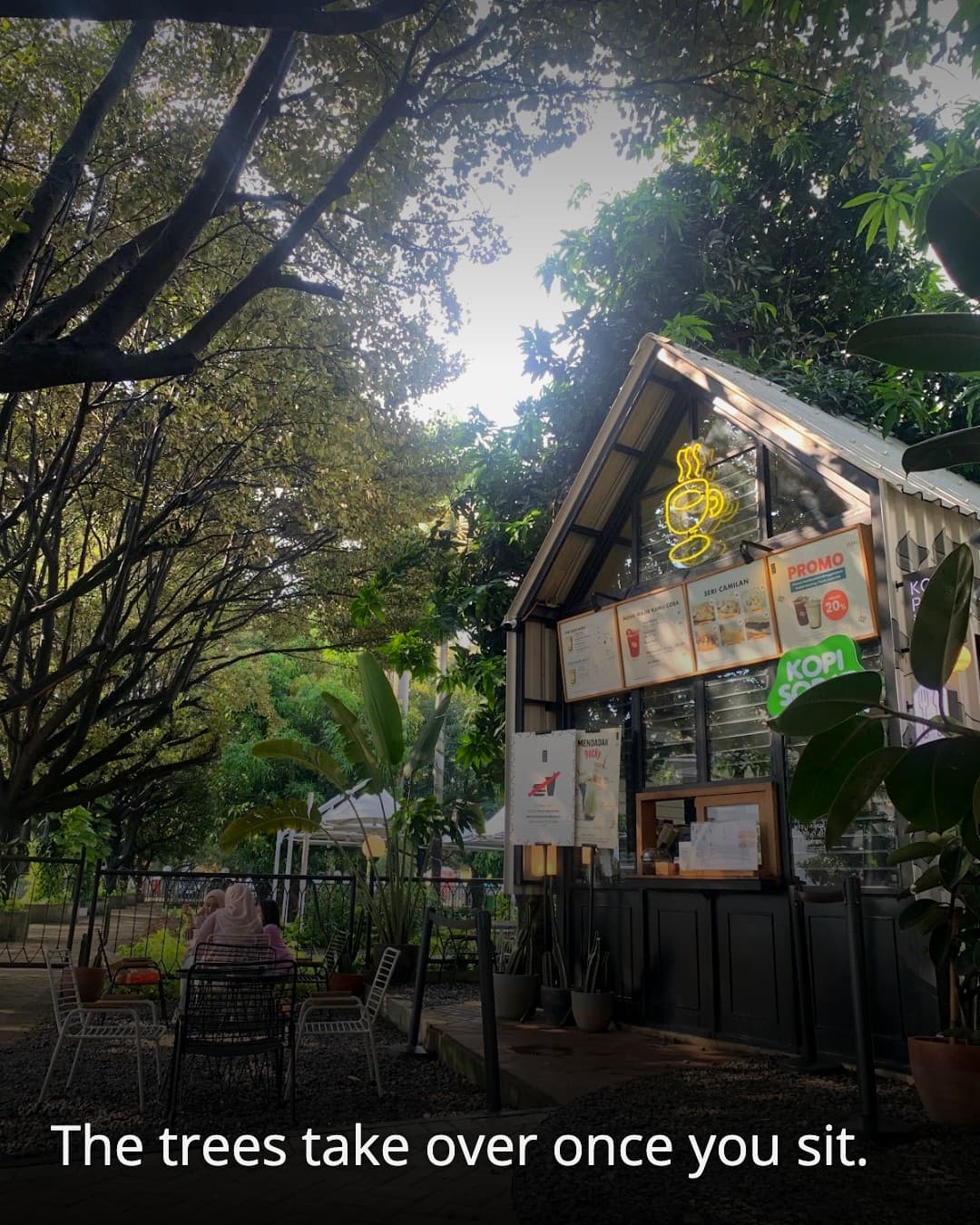 Kopi Nako BNI Kota Tua seating under trees